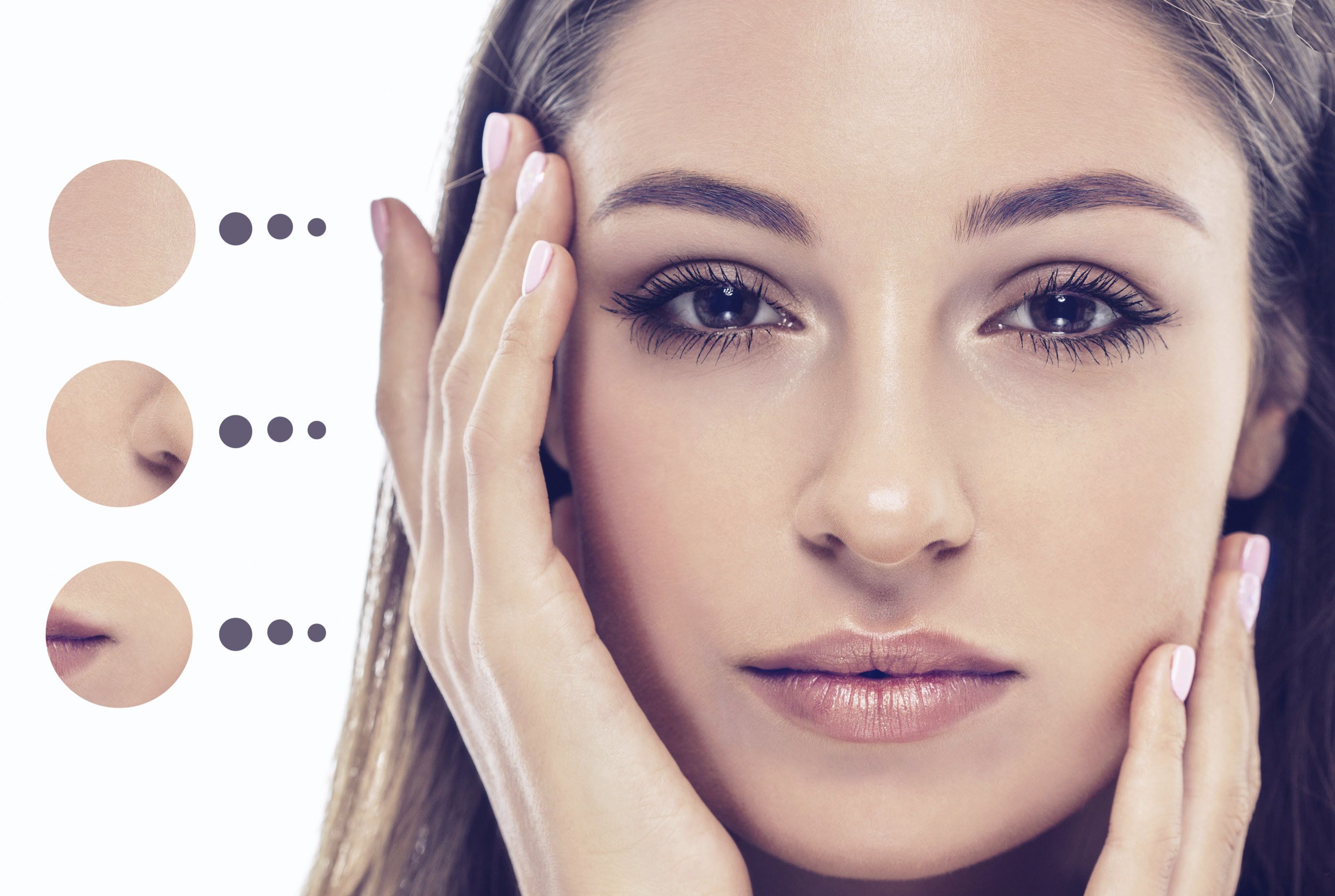 Beautiful woman holding hands to face