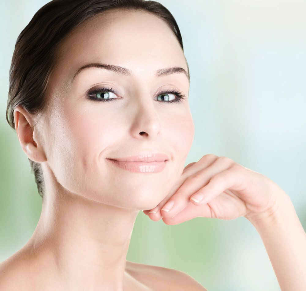 Woman's face with treatment areas highlighted